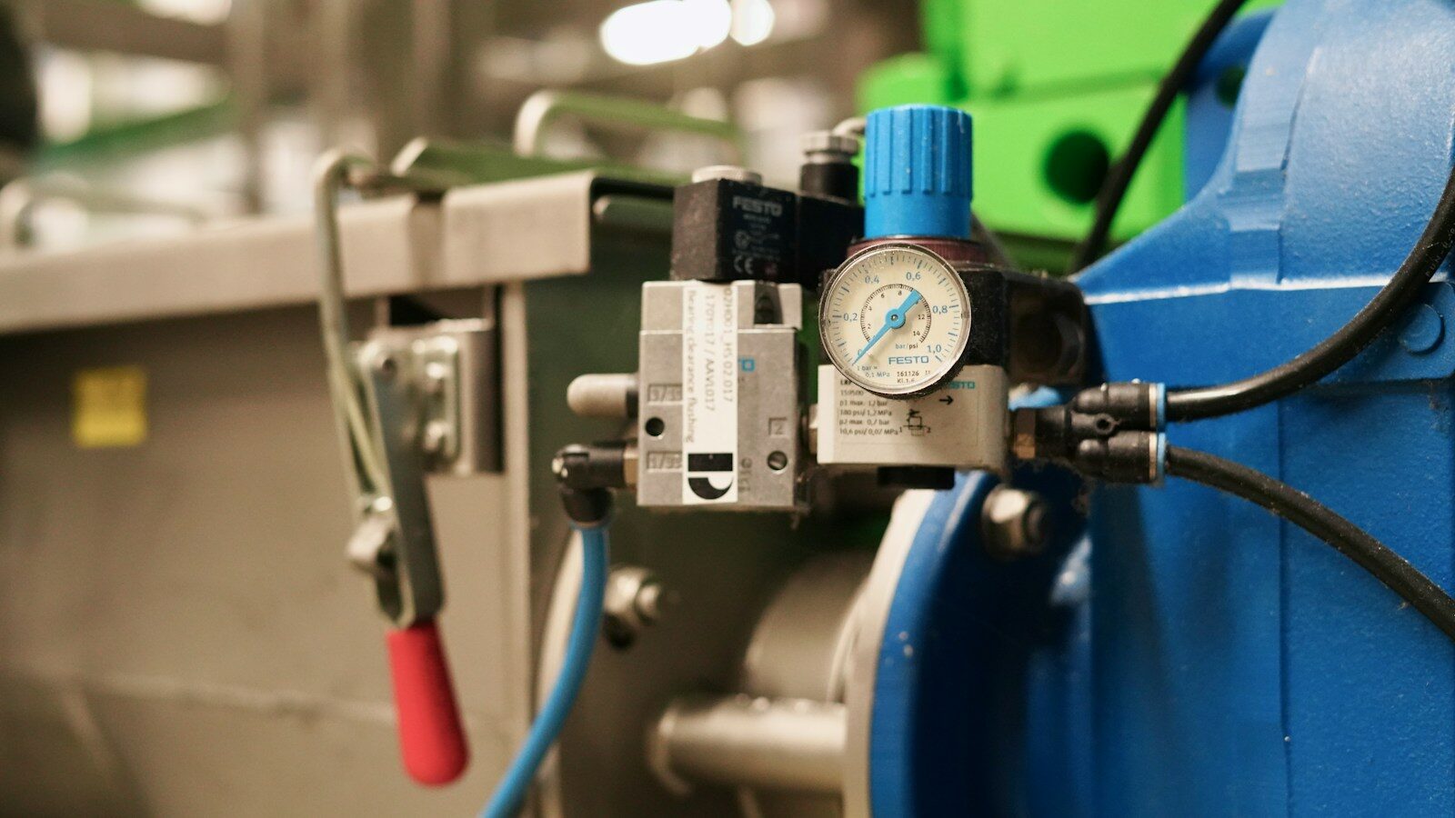 a machine with a gauge on the side of it